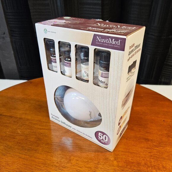 New one NUVOMED PORTABLE AROMA DIFFUSER W/ 4 X 5ml OIL BOTTLES included - Picture 2 of 6